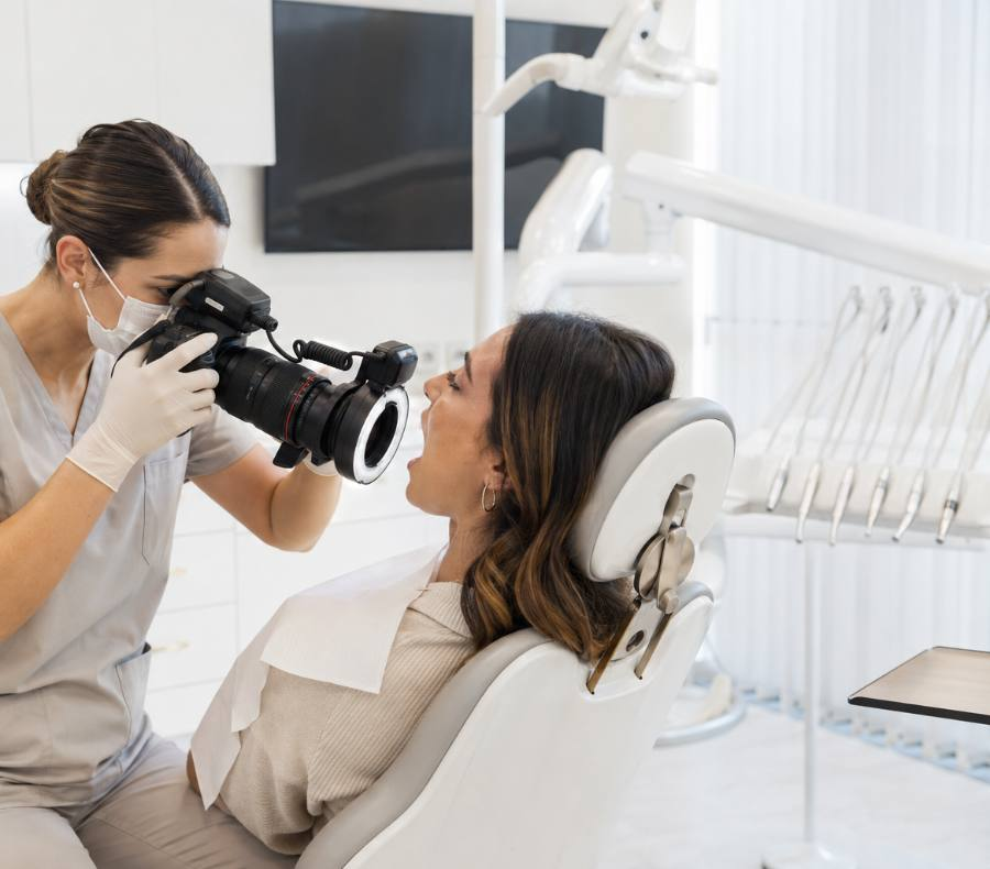 Clinician capturing clinical photography with a DSLR camera